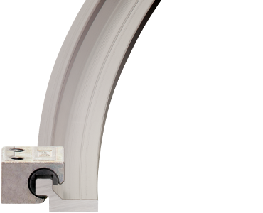 Linear housing for curved rails